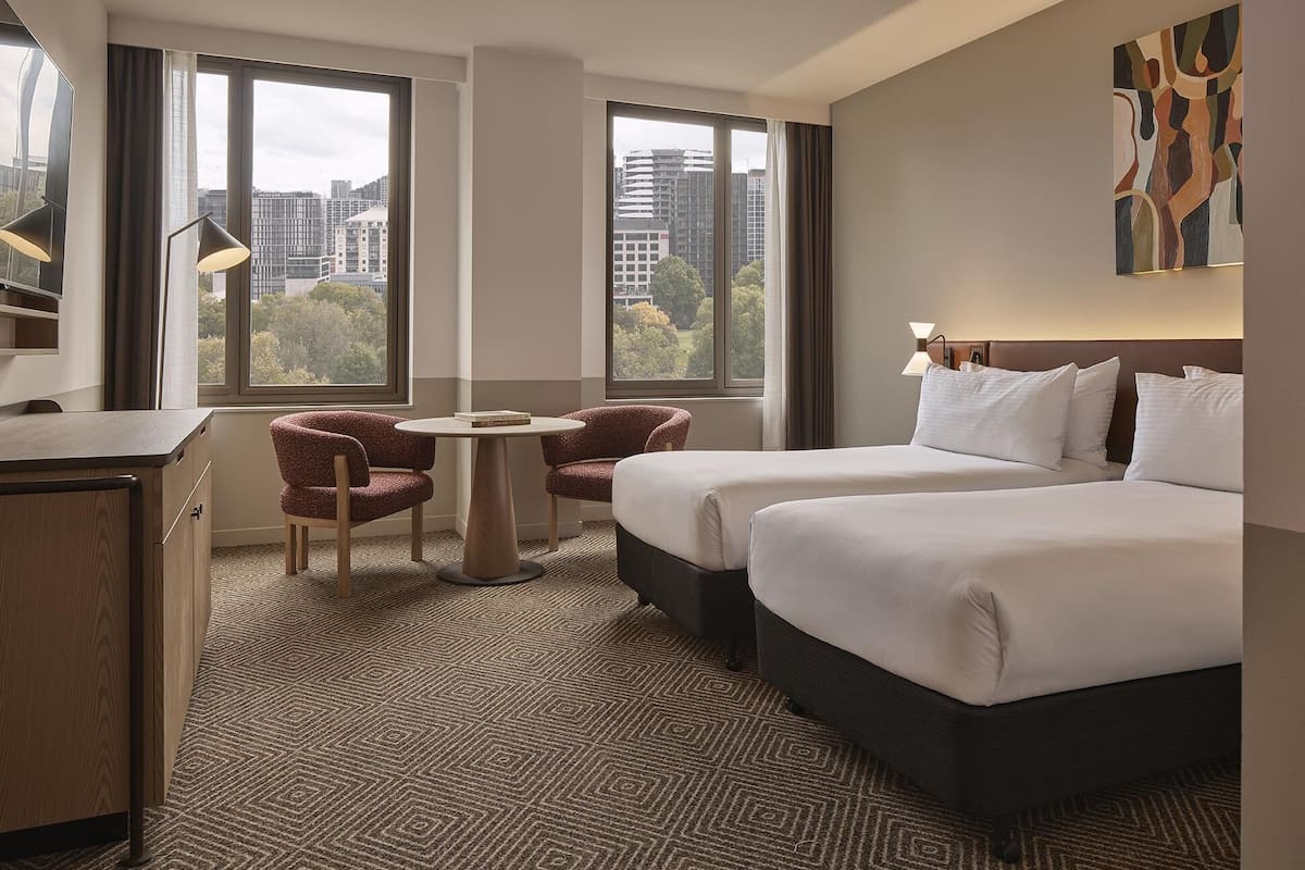 Twin Room (Newly Renovated) | Minibar, in-room safe, desk, laptop workspace