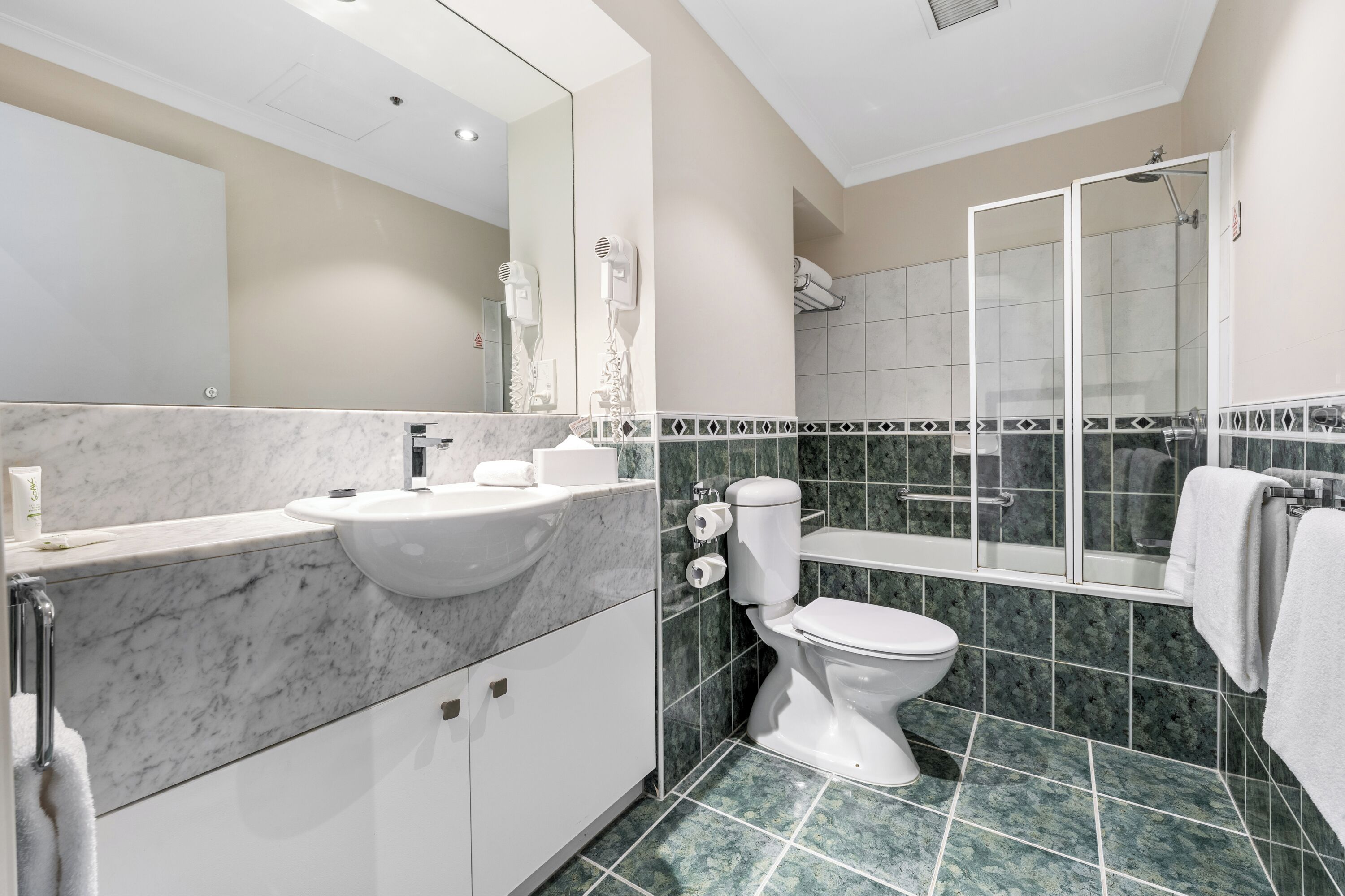 three bedroom river view suite | bathroom | shower, free toiletries, hair dryer, towels