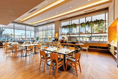 Daily buffet breakfast (AUD 36.00 per person)