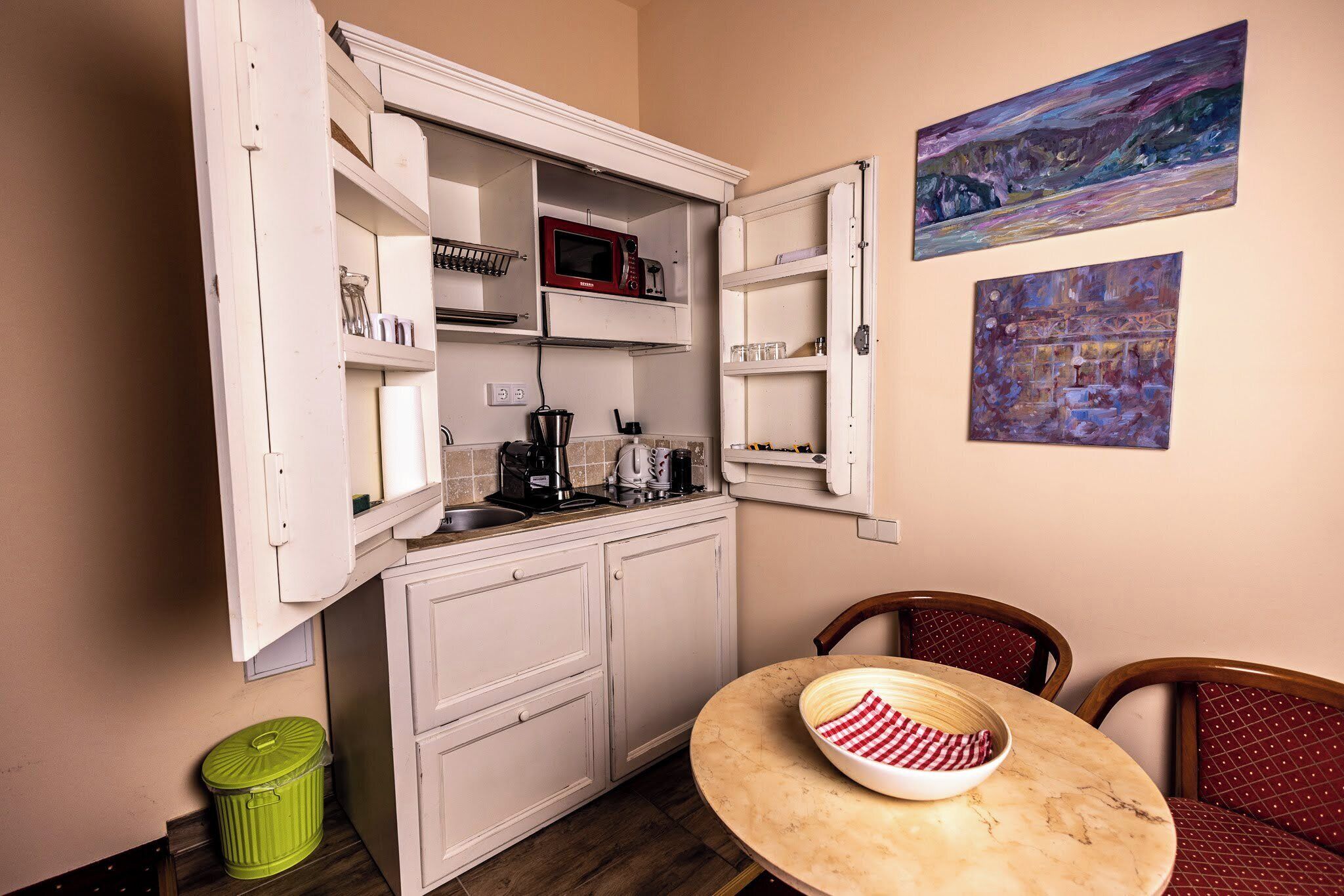 full-sized fridge, microwave, stovetop, espresso maker