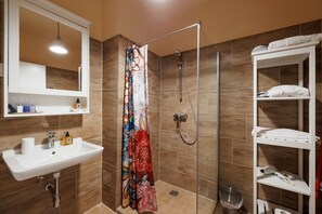 Premium Studio | Bathroom | Designer toiletries, hair dryer, bathrobes, slippers