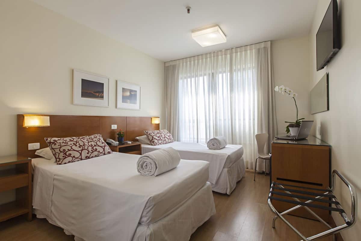 Hypo-allergenic bedding, down duvets, minibar, in-room safe