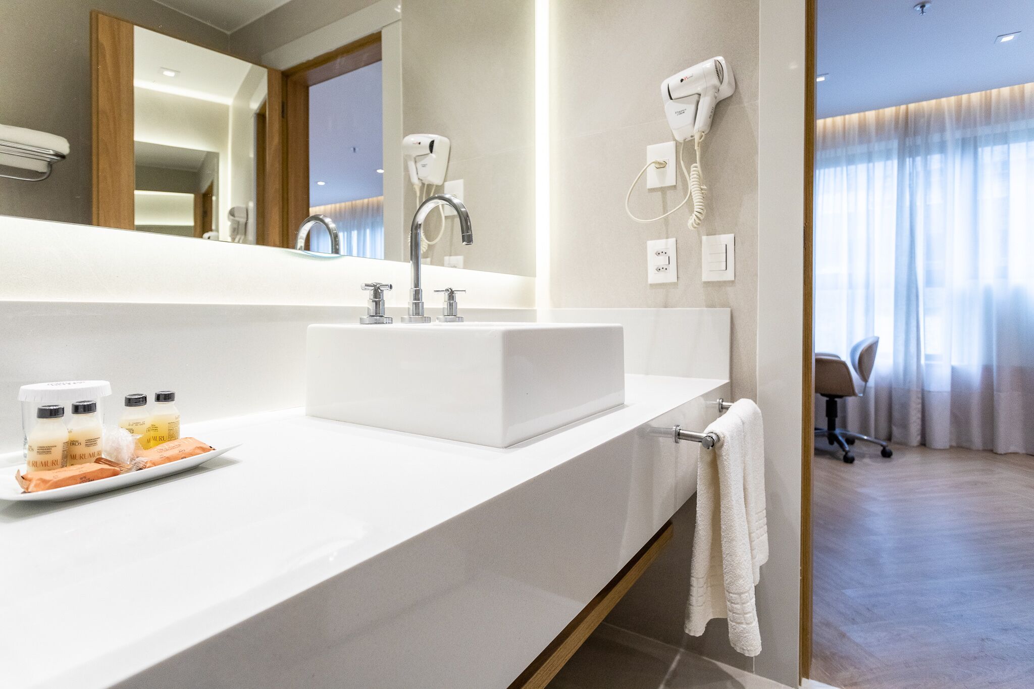 deluxe triple room | bathroom | shower, designer toiletries, hair dryer, towels