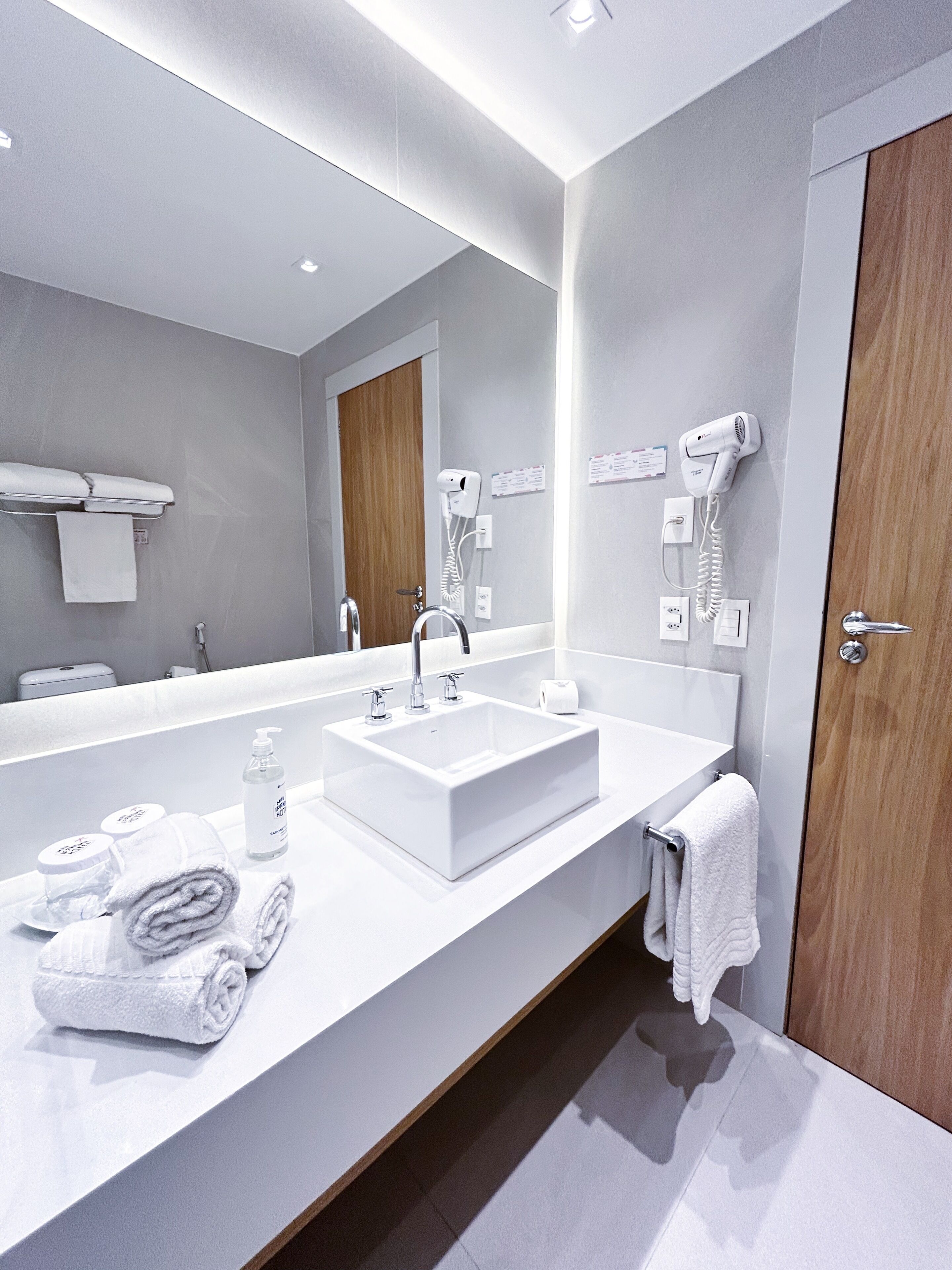 deluxe triple room | bathroom | shower, designer toiletries, hair dryer, towels