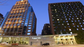 A modern hotel with a glass facade and a sign reading "INTERCONTINENTAL". - InterContinental Santiago by IHG (Santiago)