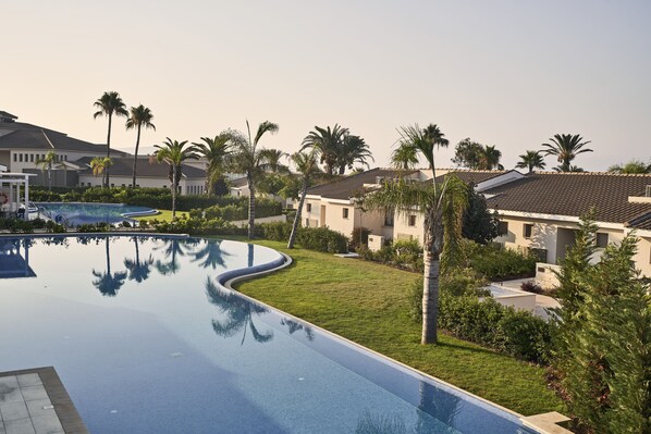 Indoor pool, 2 outdoor pools, pool umbrellas, sun loungers
