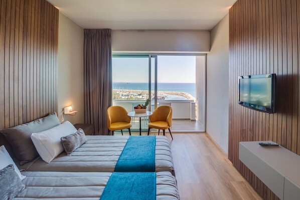 Habitación estándar, vista al mar | Ropa de cama de alta calidad y minibar 