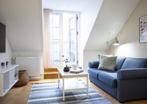Suite med havudsigt | Living area | TV