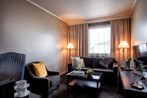 Suite – junior | Oppholdsrom | En 32-tommers TV med kabel-kanaler