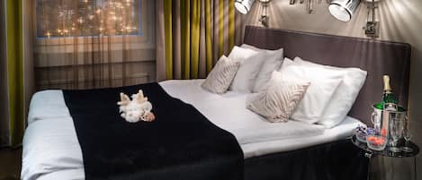 Premium bedding, minibar, in-room safe, desk