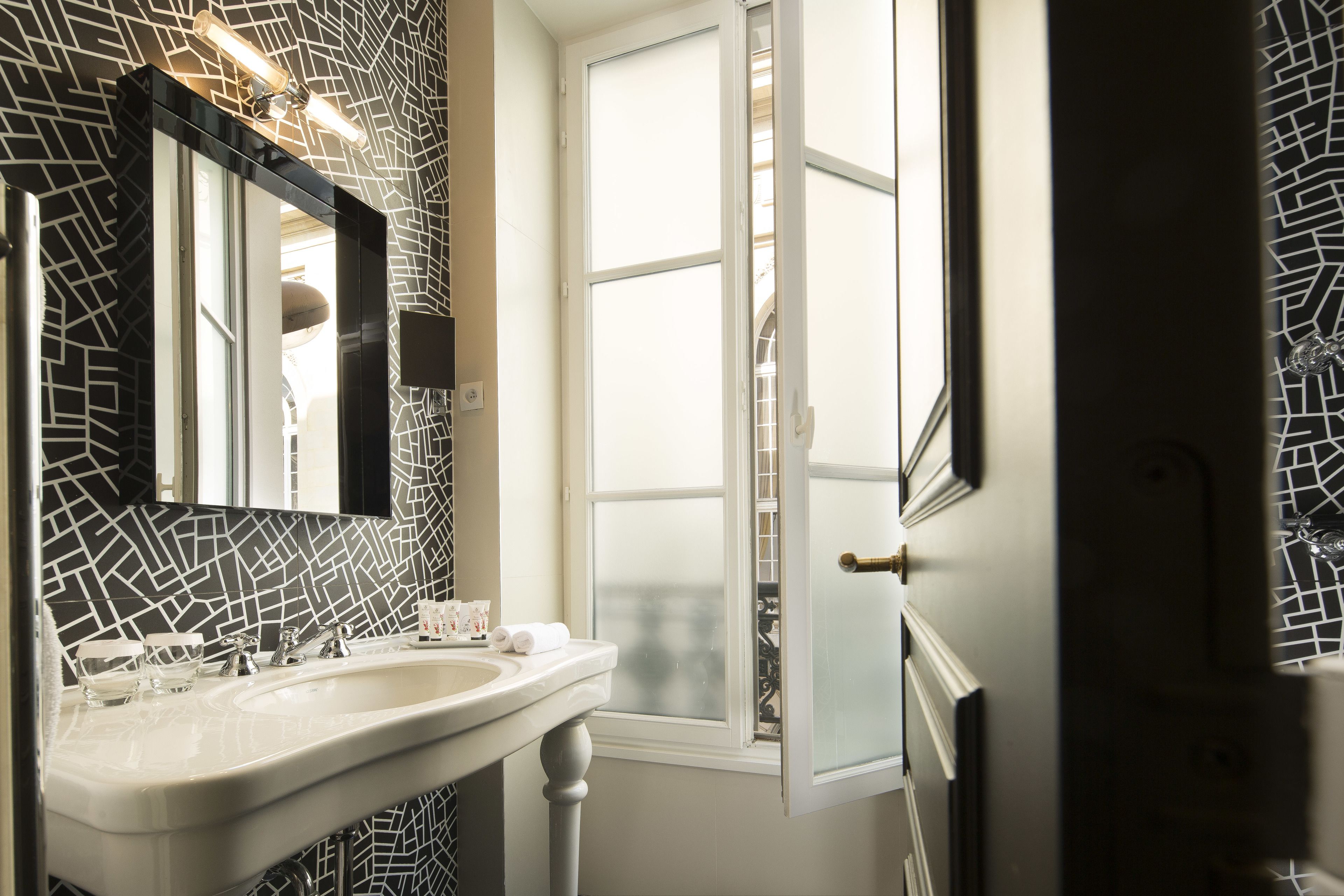 deep-soaking bathtub, eco-friendly toiletries, hair dryer, bathrobes