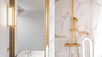 Een moderne badkamer met een rechthoekig wastafel, een behang met patroon, en een gouden douchekop.