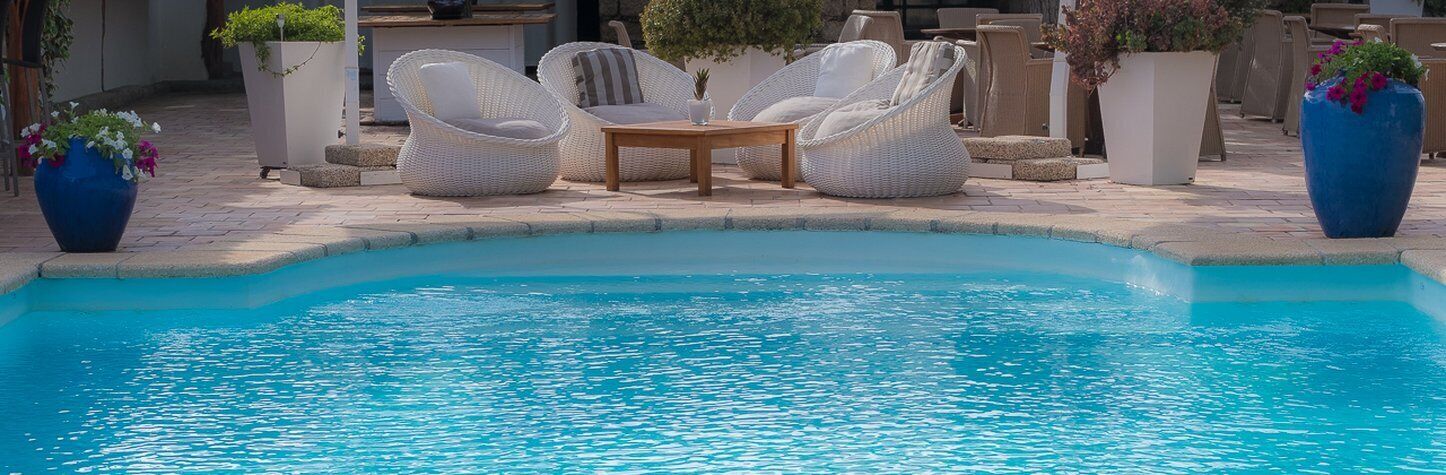 outdoor pool, pool umbrellas, pool loungers