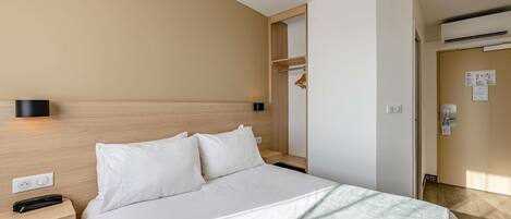 Desk, laptop workspace, blackout drapes, soundproofing