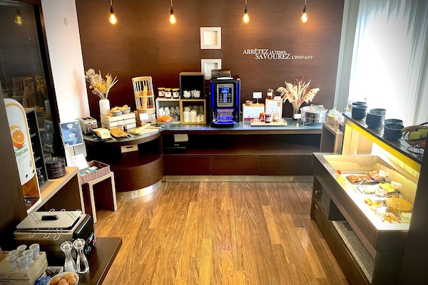 Daily buffet breakfast (EUR 12.30 per person)