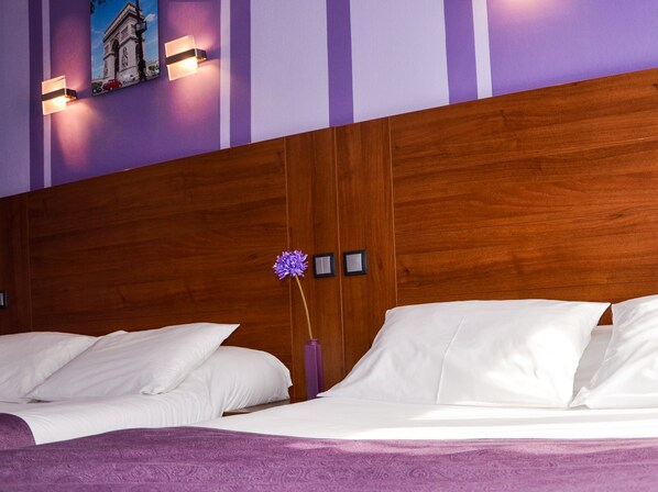 Quadruple Room | Memory-foam beds, in-room safe, individually decorated, desk