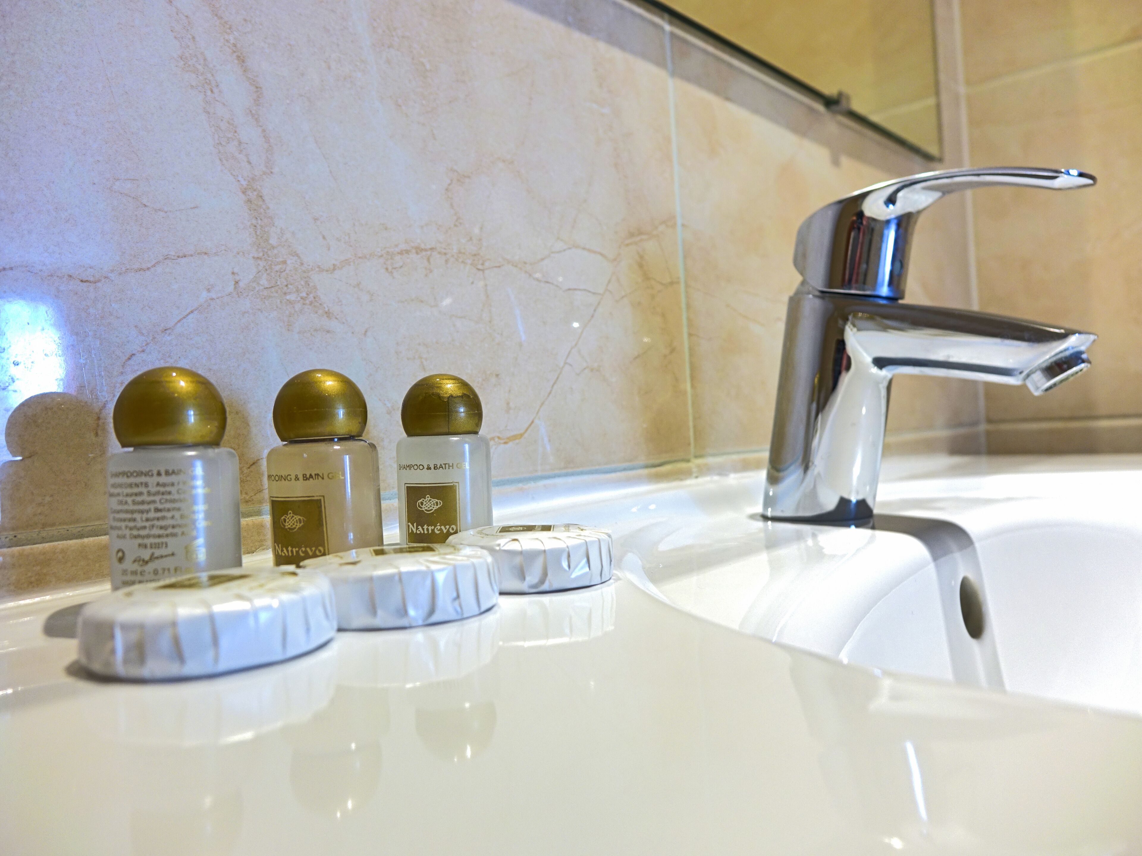 family room | bathroom amenities | shower, hair dryer, towels