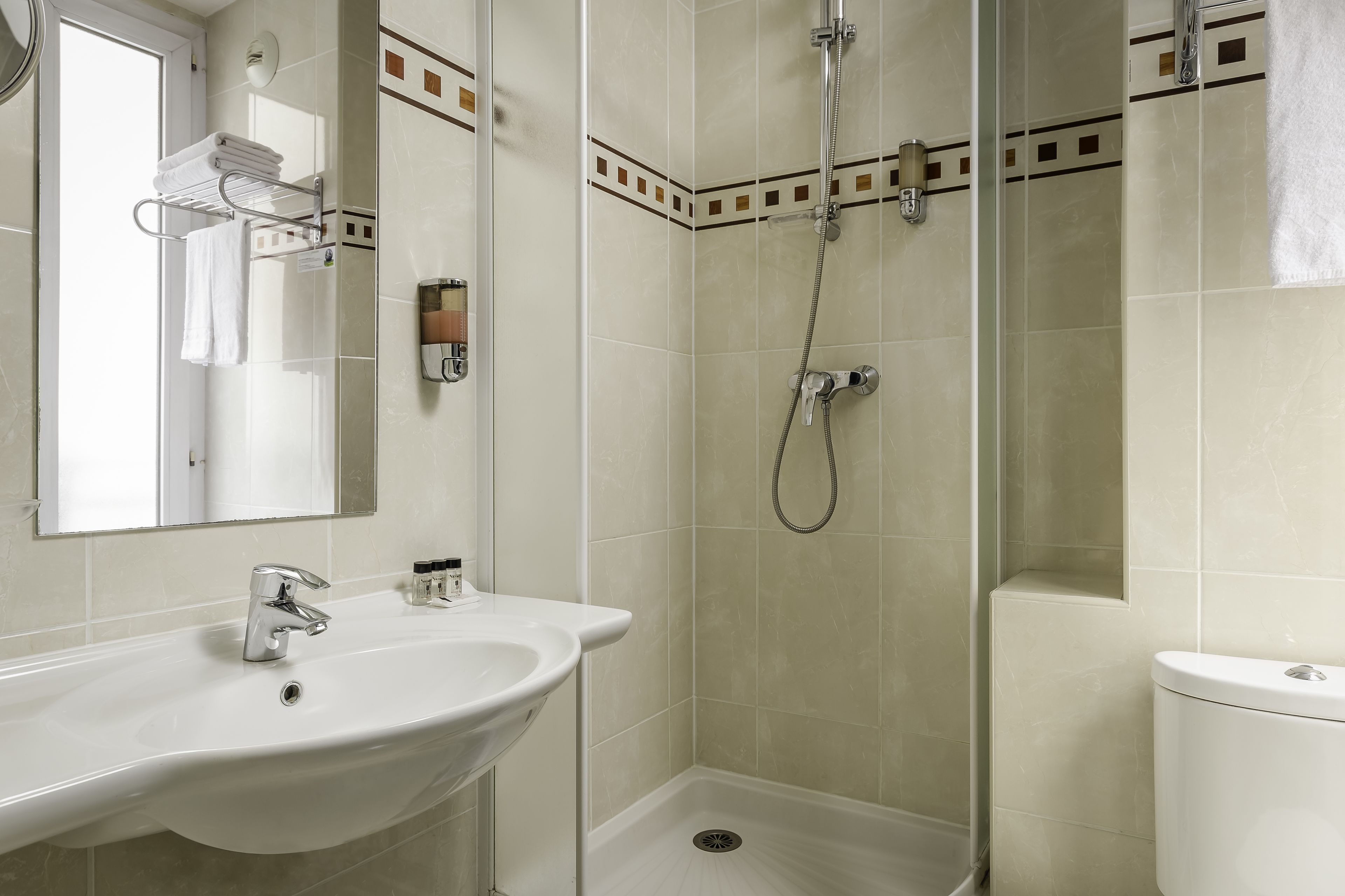 hair dryer, towels, soap, shampoo