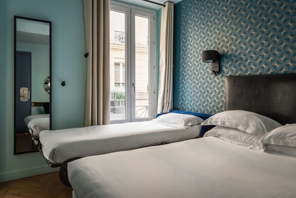 Basic Triple Room | Select Comfort beds, in-room safe, desk, iron/ironing board