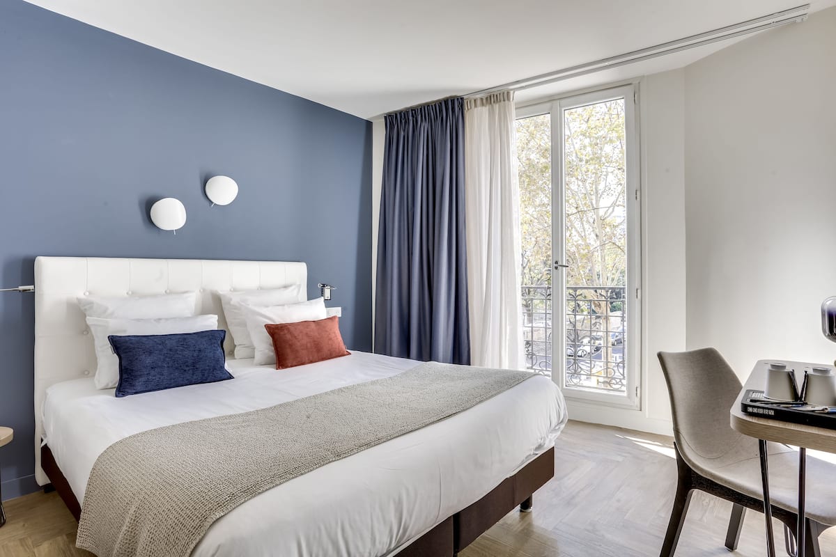 premium bedding, desk, blackout curtains, soundproofing