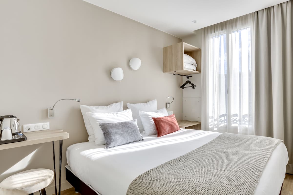 comfort double room | premium bedding, desk, blackout curtains, soundproofing