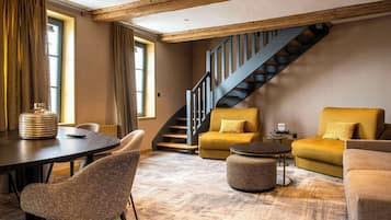 Suite, 1 King Bed, Non Smoking, Jetted Tub (Larger Room) | Minibar, in-room safe, individually decorated, individually furnished