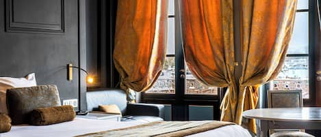 Suite, 1 Queen Bed, Non Smoking, Jetted Tub (Larger Room;with Sofabed) | 1 bedroom, minibar, in-room safe, individually decorated