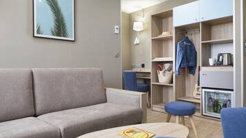 Suite Junior | Biancheria da letto di alta qualità, minibar, una cassaforte in camera