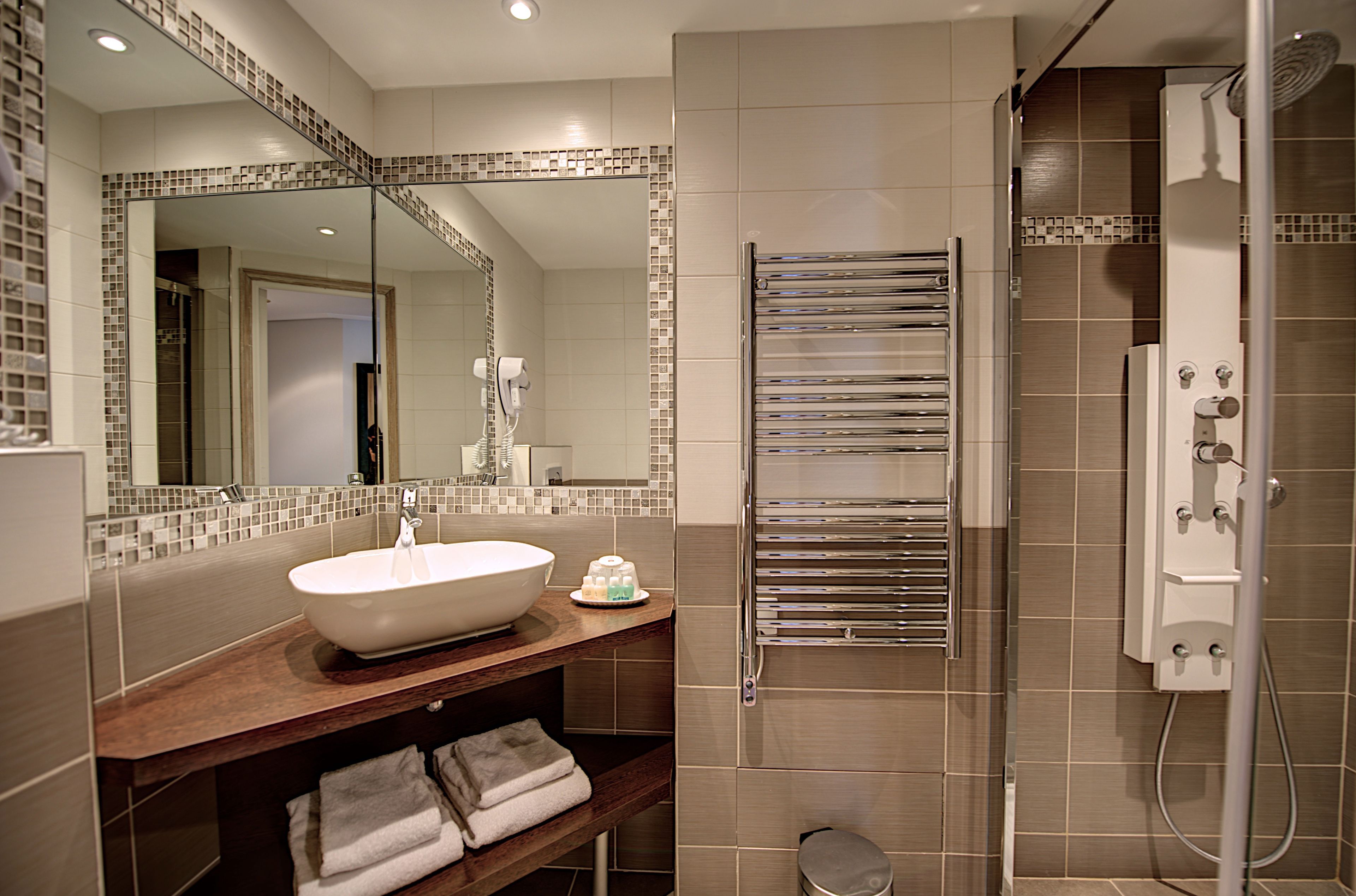 superior double room | bathroom | free toiletries, hair dryer, towels