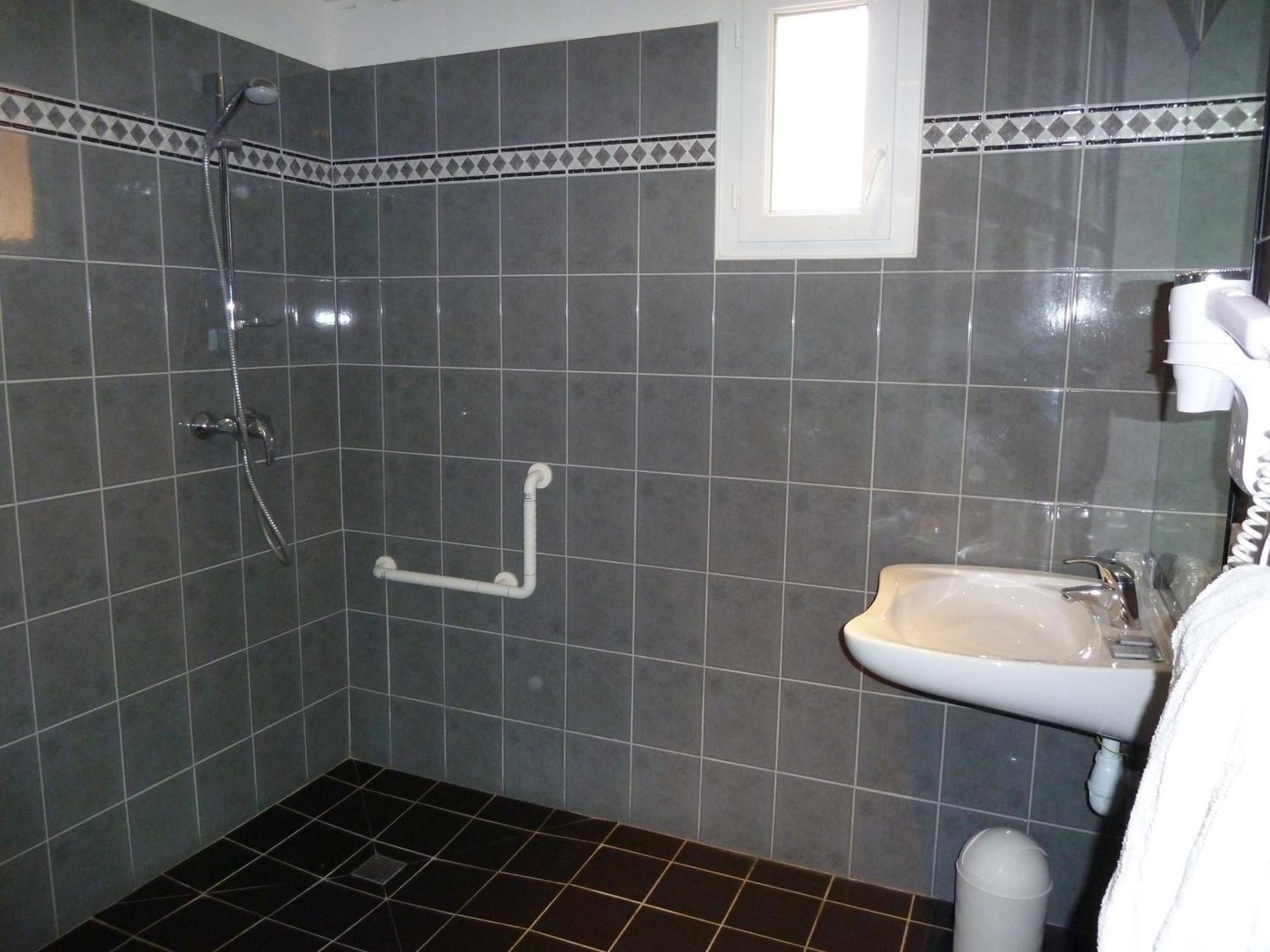 bathtub, free toiletries, hair dryer, towels