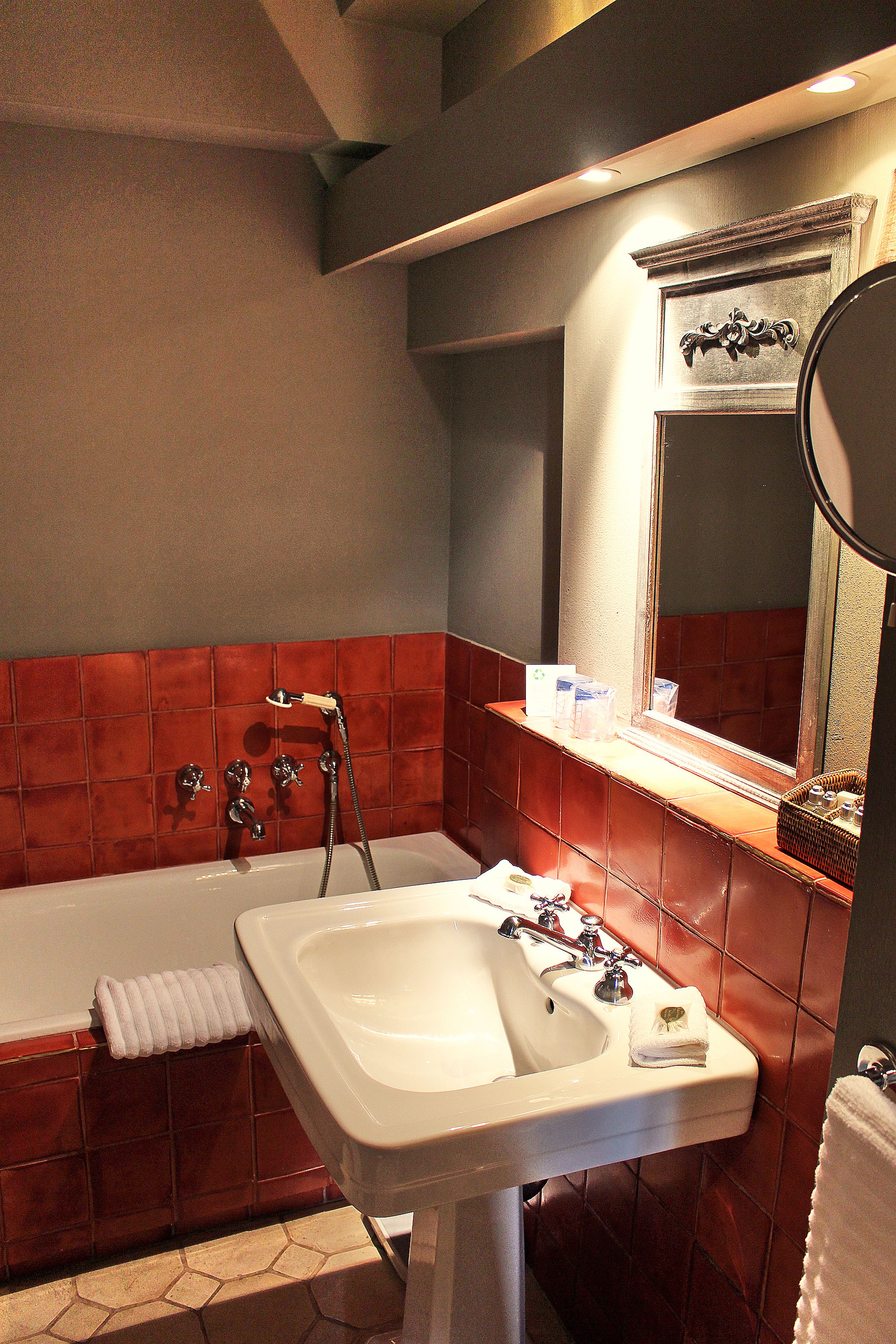 luxury double room | bathroom | designer toiletries, hair dryer, towels