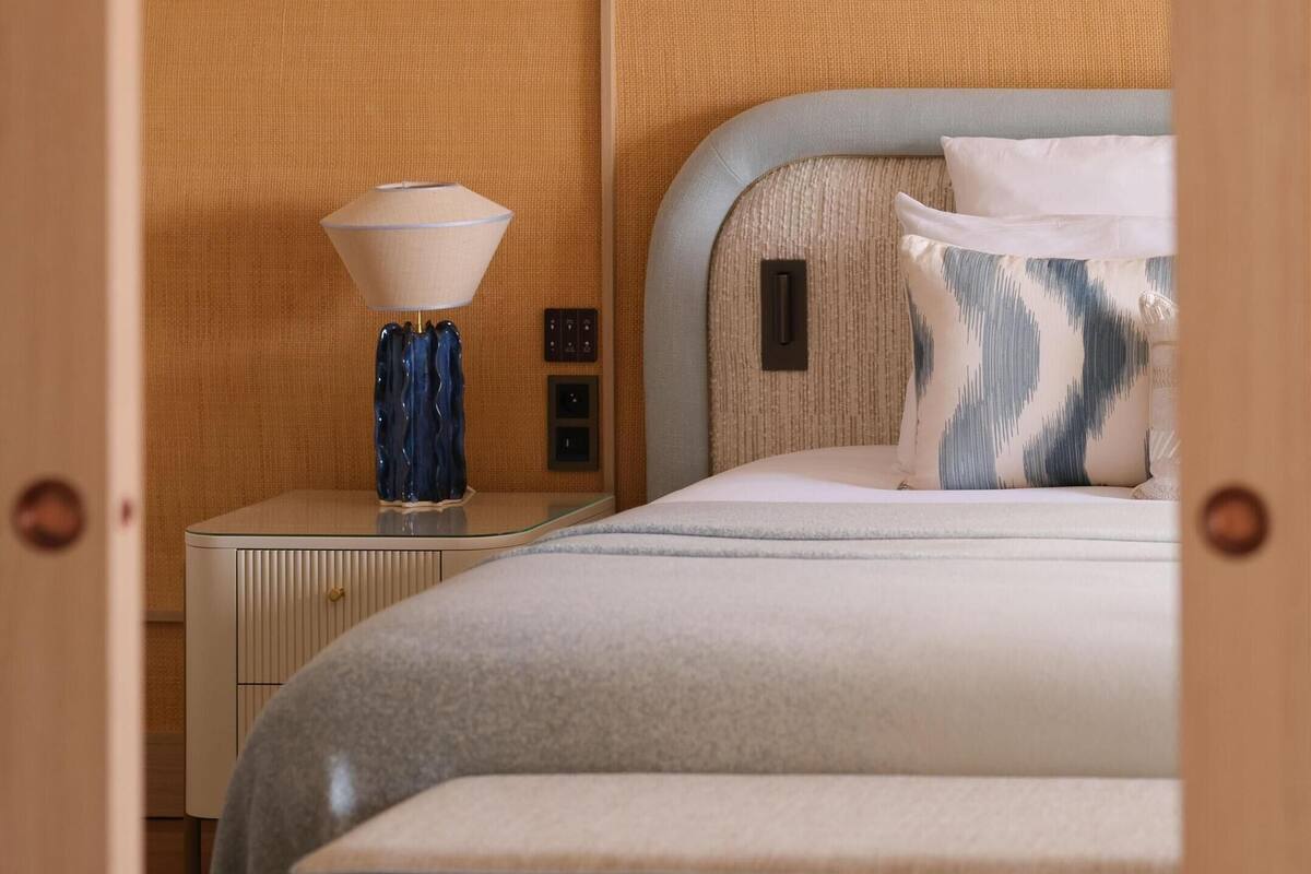 Suite, Pool View | Minibar, in-room safe, desk, blackout drapes