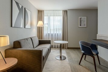Ropa de cama de alta calidad y minibar 