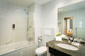 Designer toiletries, hair dryer, children's robes, slippers