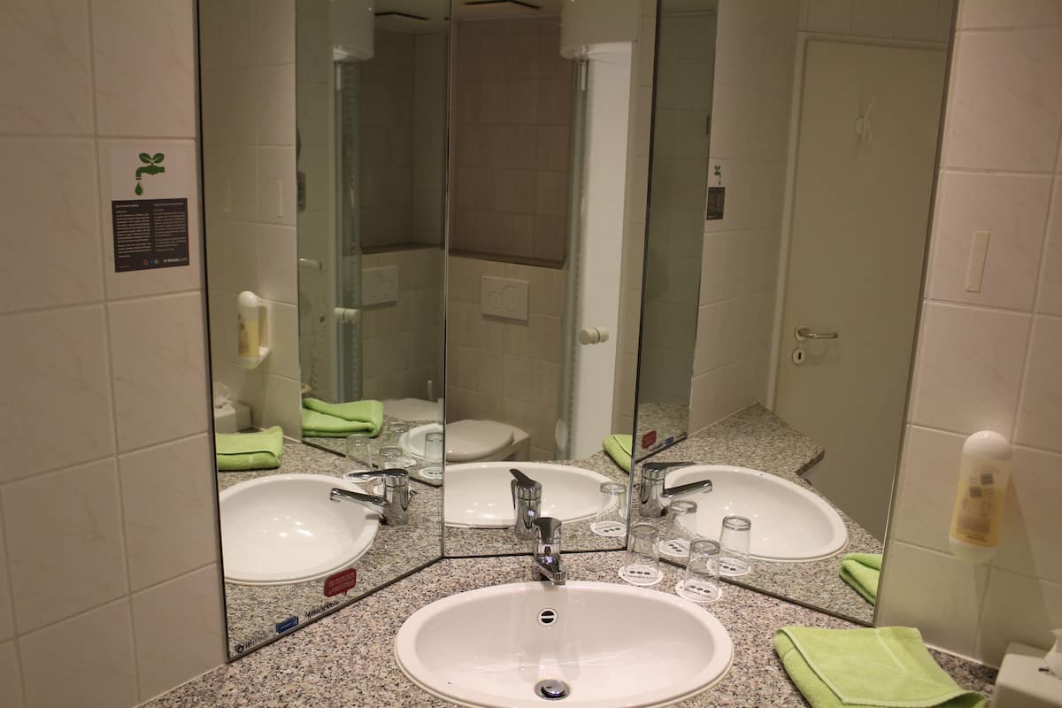 bathtub, free toiletries, hair dryer, towels