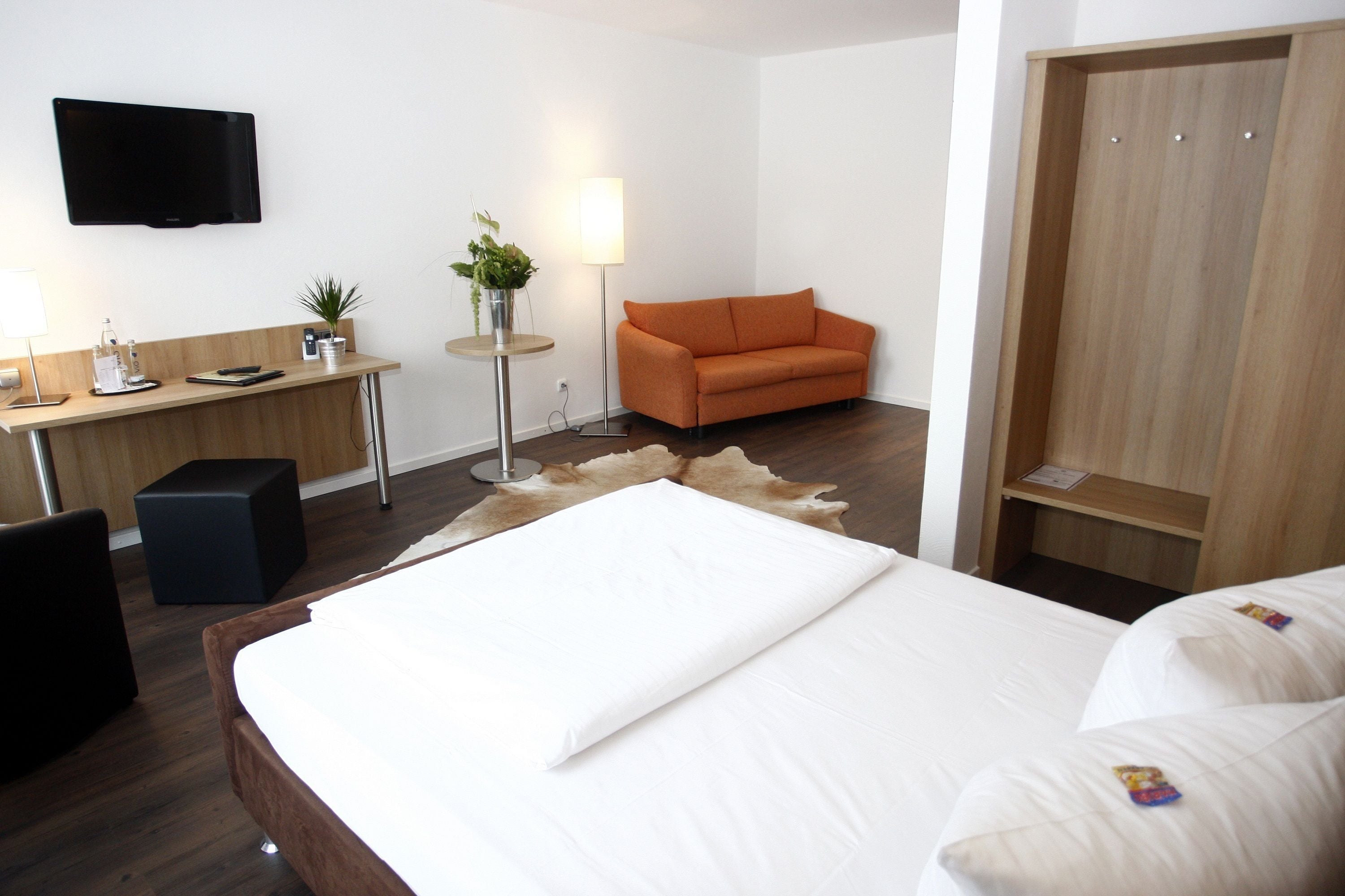 hypo-allergenic bedding, down duvets, minibar, in-room safe