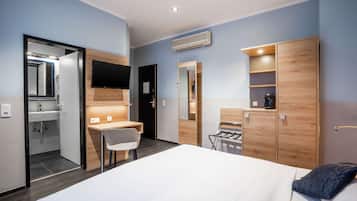 Habitación empresarial, 2 camas individuales, para no fumadores | Minibar, caja de seguridad en la habitación y escritorio