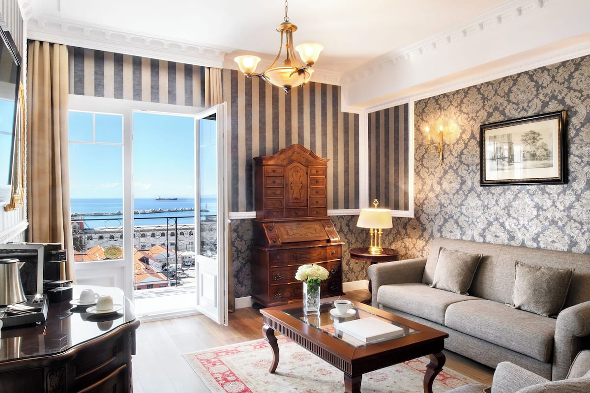 sea view executive suite | living area | 32-inch smart tv with satellite channels