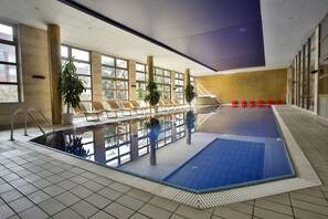 Indoor pool, open 7:00 AM to 7:30 PM, pool loungers, lifeguards on site