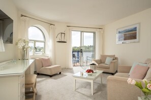 Executive Suite, 1 Queen Bed, River View | Living area | Flat-screen TV