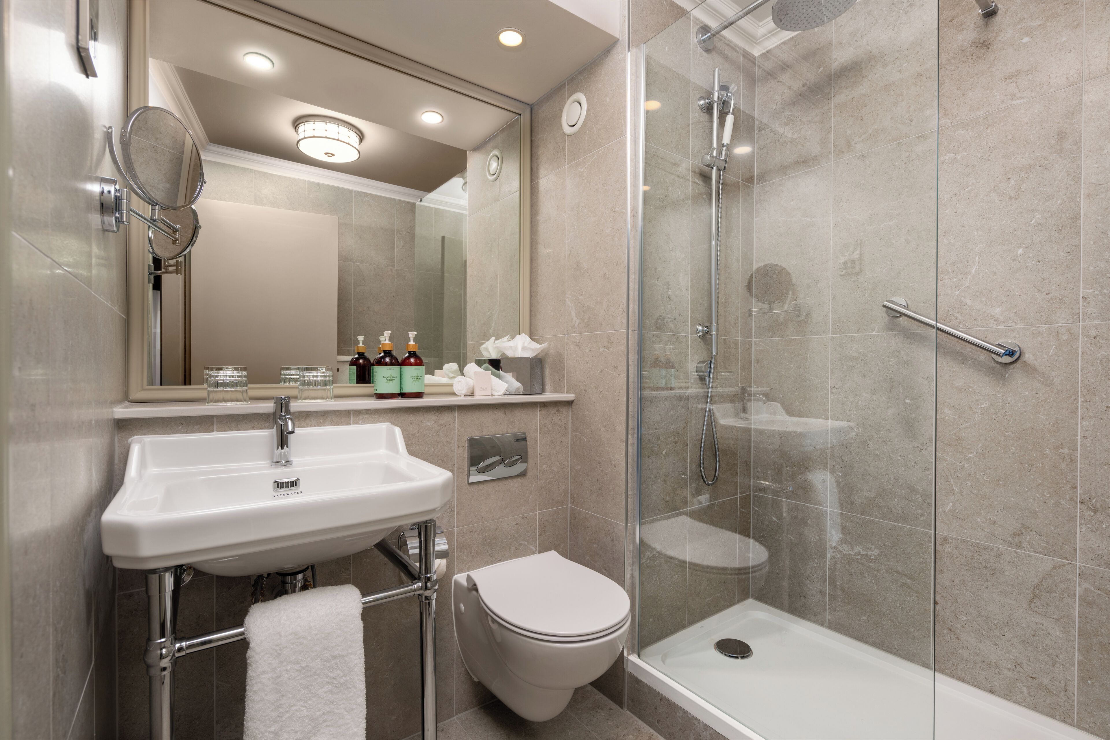 combined shower/bathtub, free toiletries, hair dryer, towels