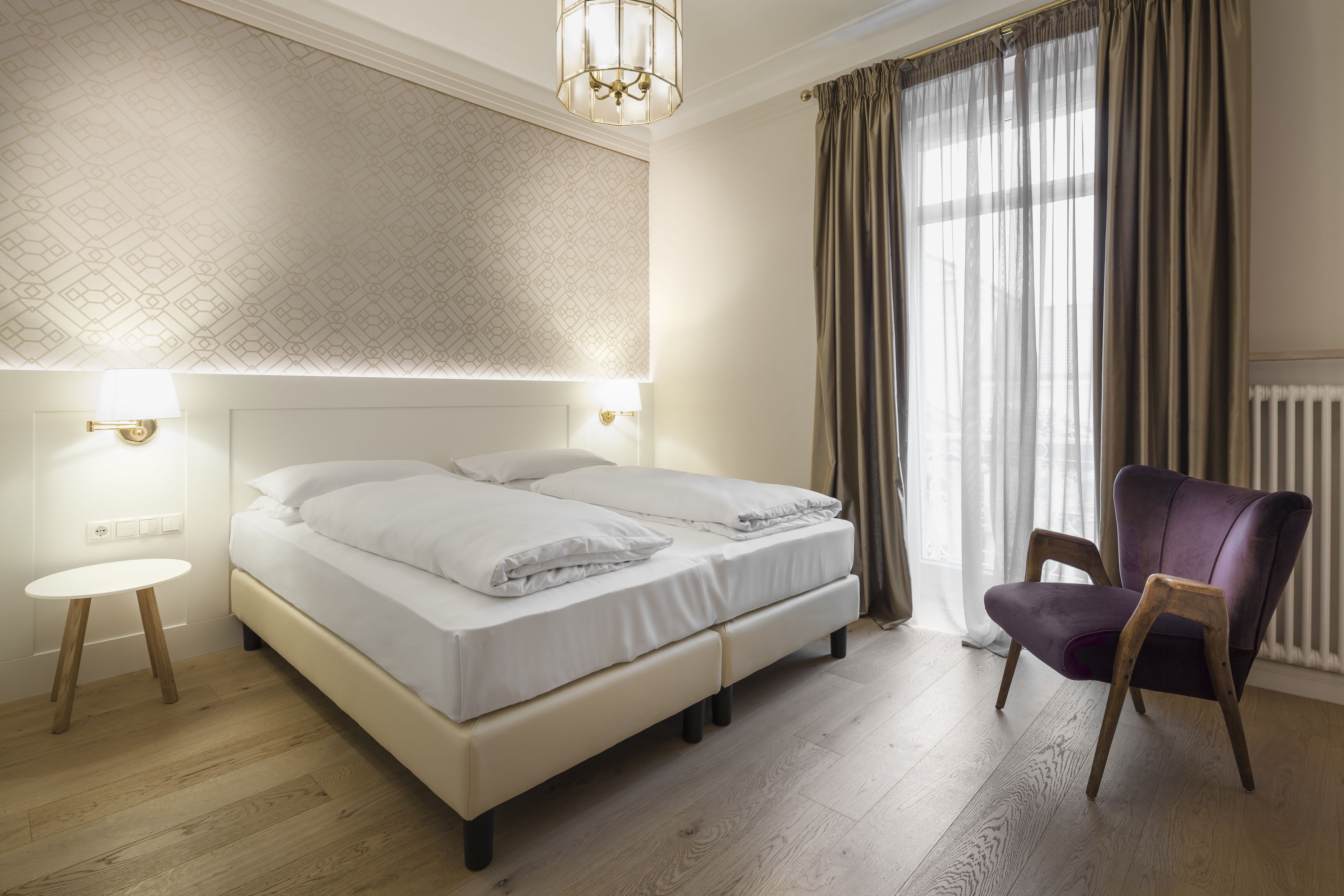 hypo-allergenic bedding, down duvets, minibar, in-room safe