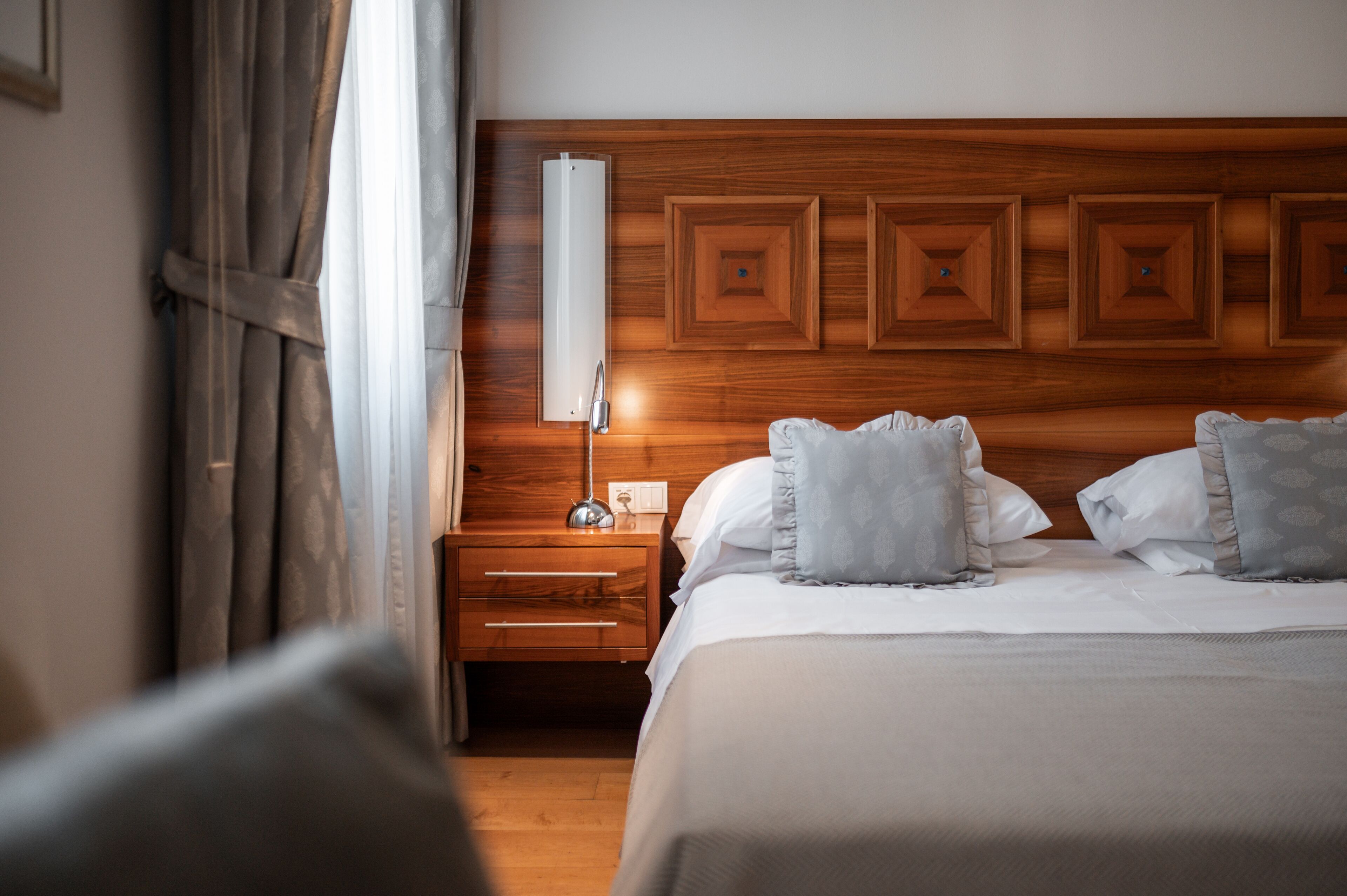 hypo-allergenic bedding, down duvets, minibar, in-room safe