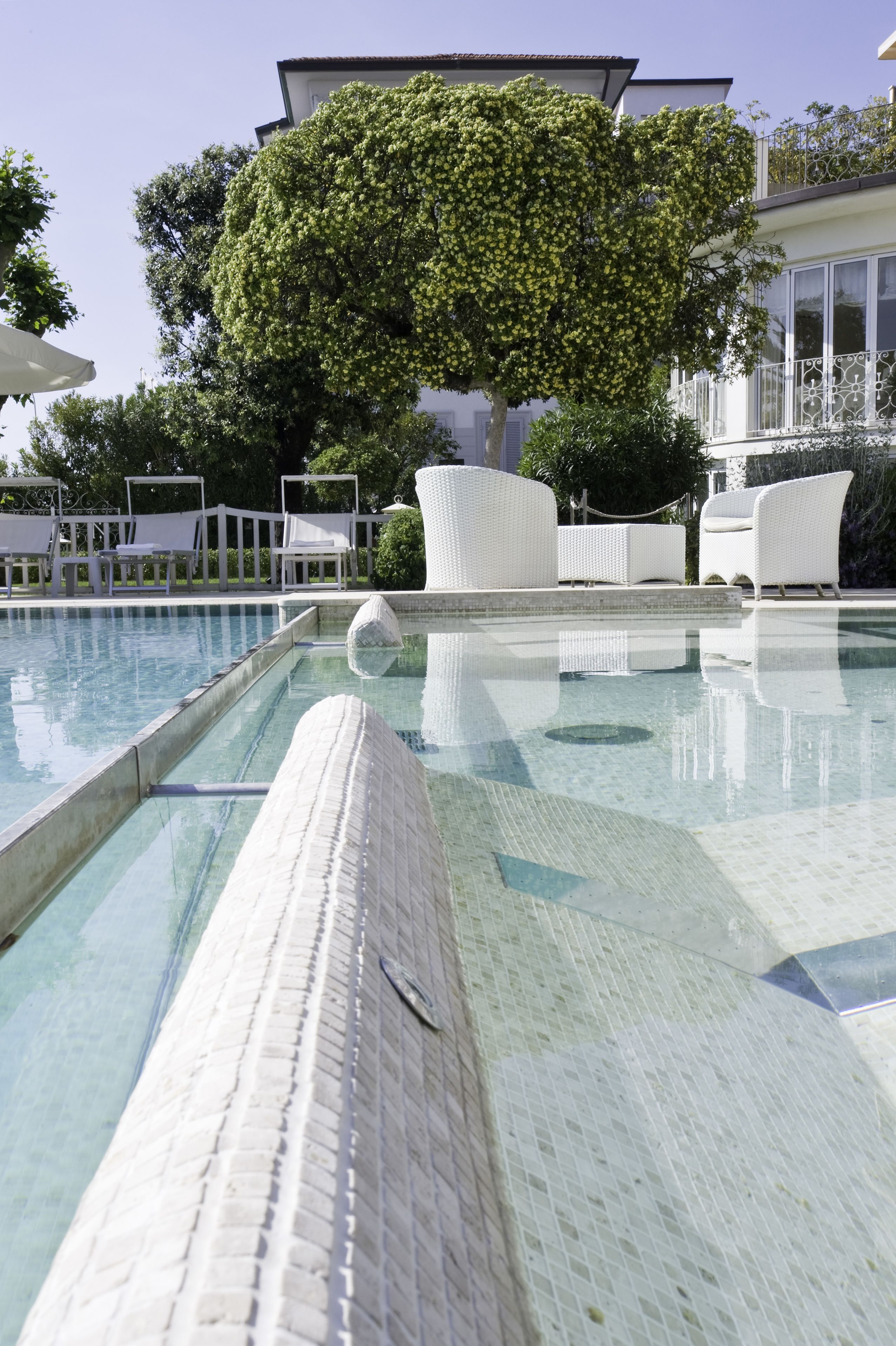 seasonal outdoor pool, pool umbrellas, pool loungers