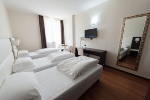 Ropa de cama de alta calidad, colchones con pillow-top y minibar 