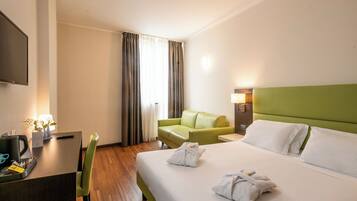 Premium bedding, pillow-top beds, minibar, in-room safe