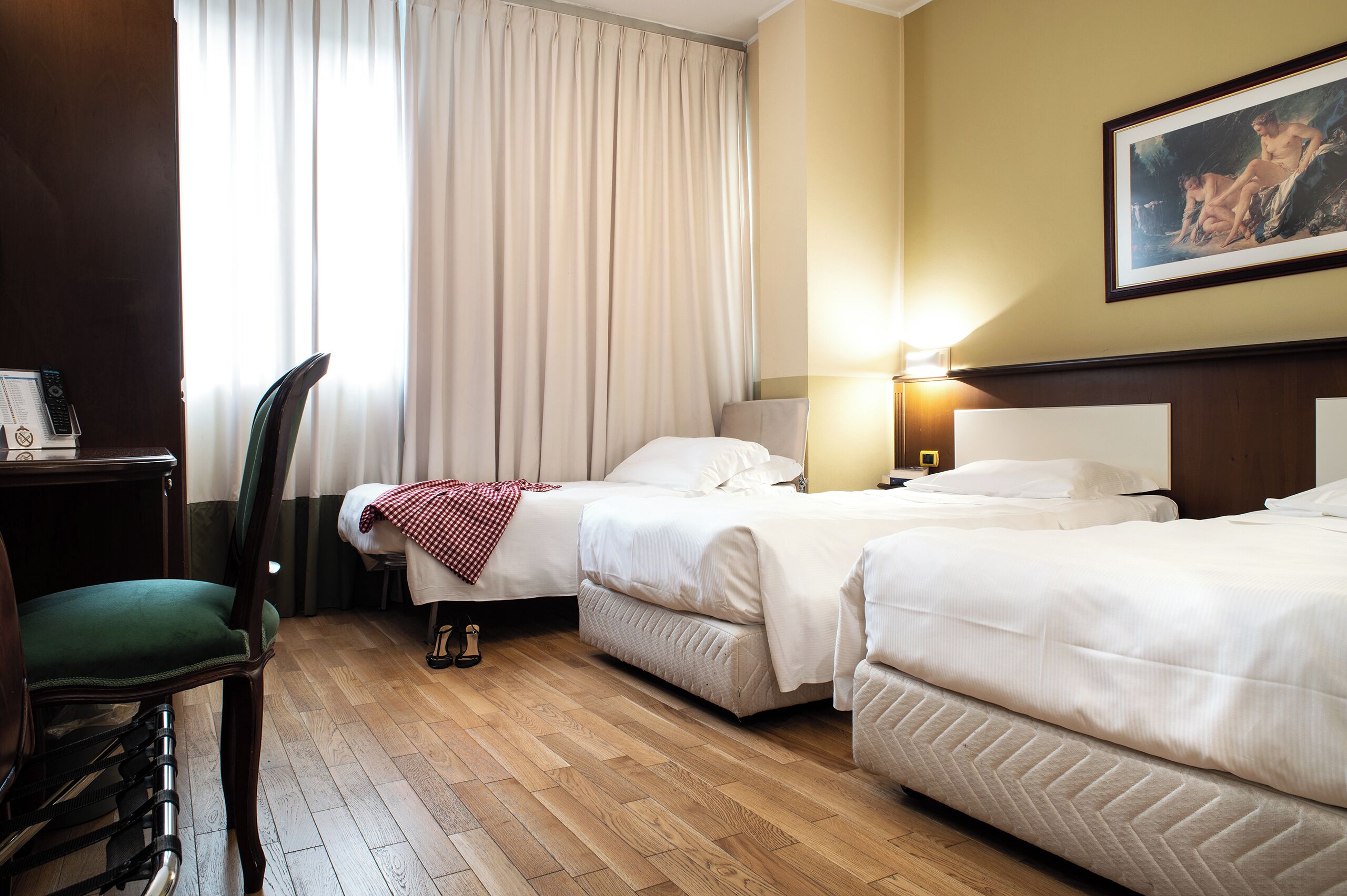 comfort triple room | premium bedding, down duvets, in-room safe, desk