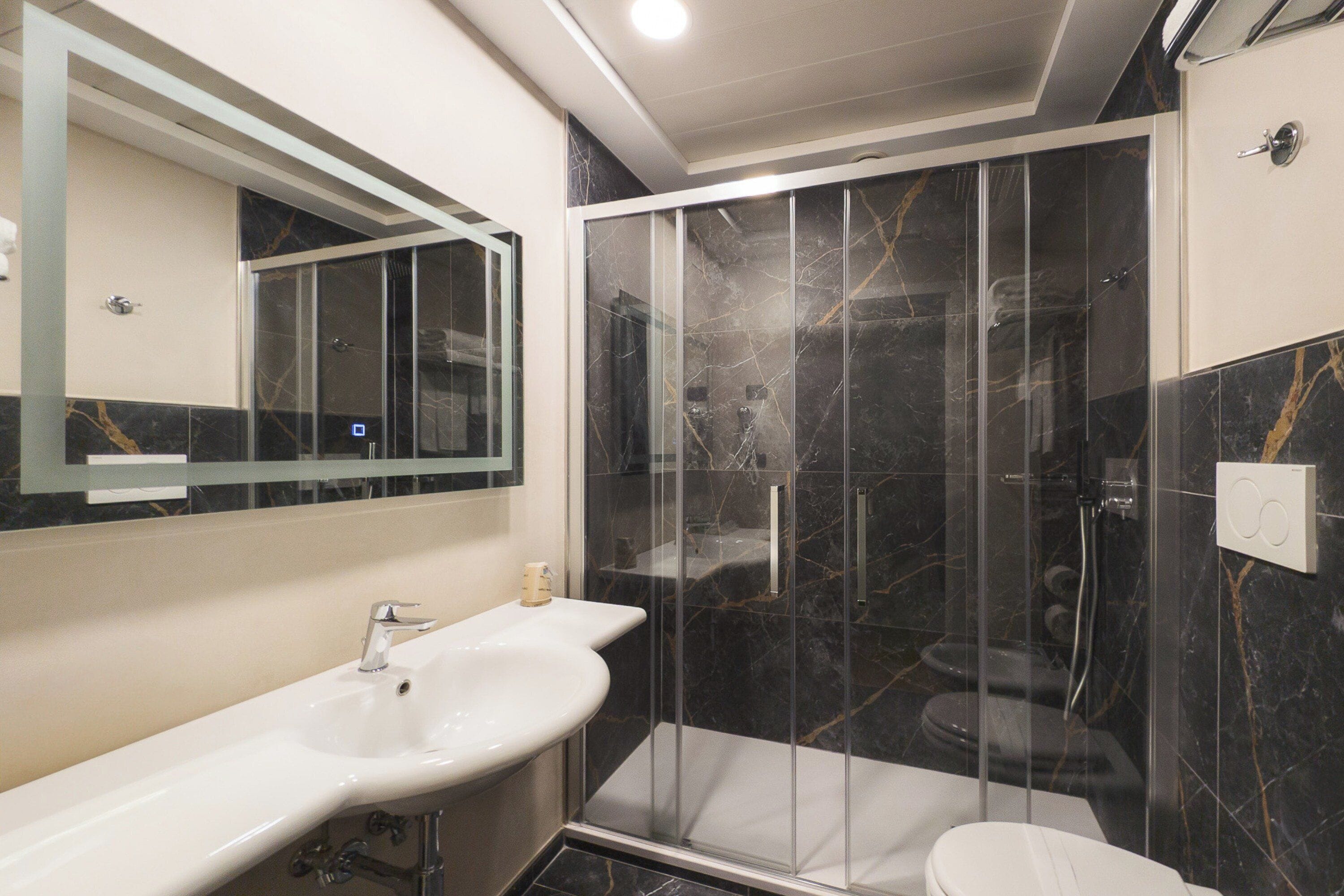 Free toiletries, hair dryer, bidet, towels