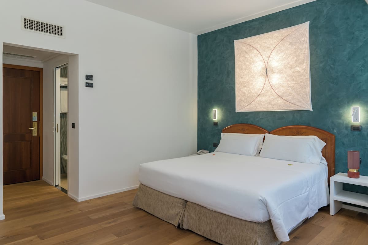 Double Room Single Use | Premium bedding, in-room safe, desk, blackout curtains