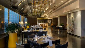 4 restaurants, breakfast, lunch, dinner served; Asian cuisine